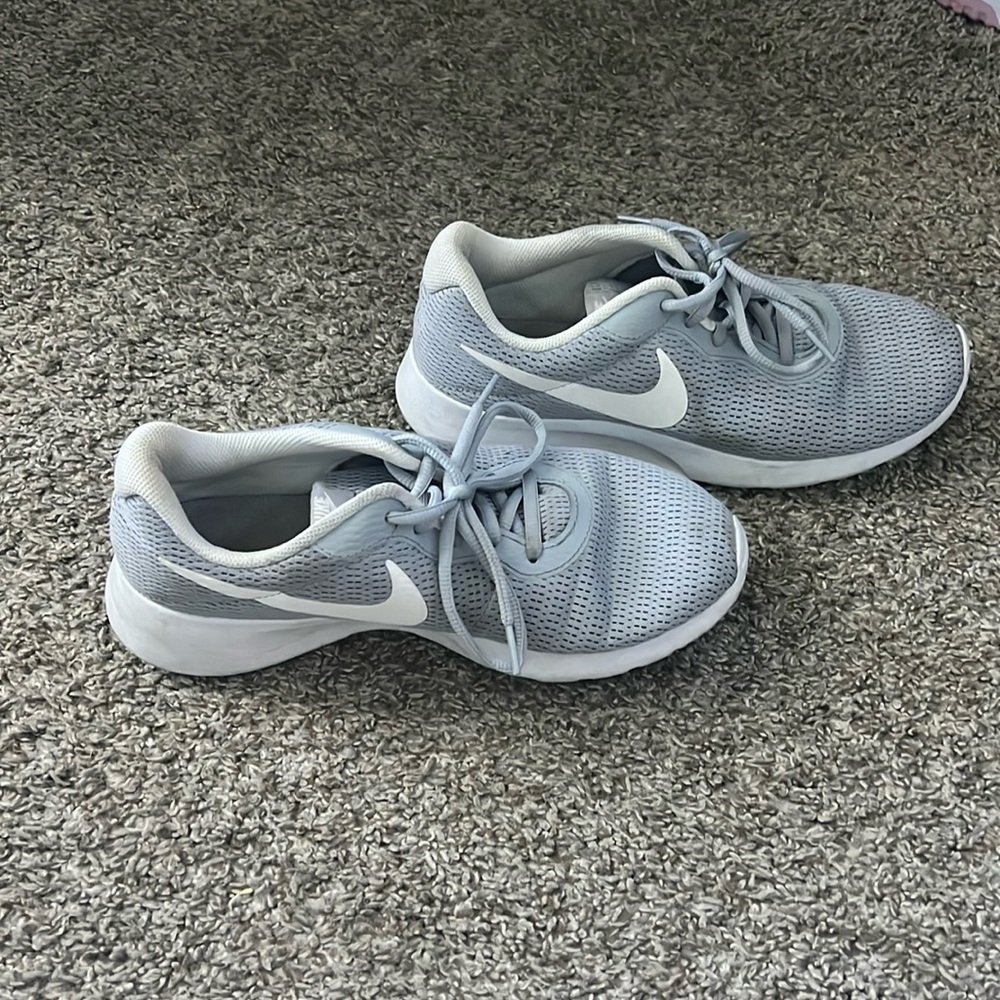 Grey nike running shoes